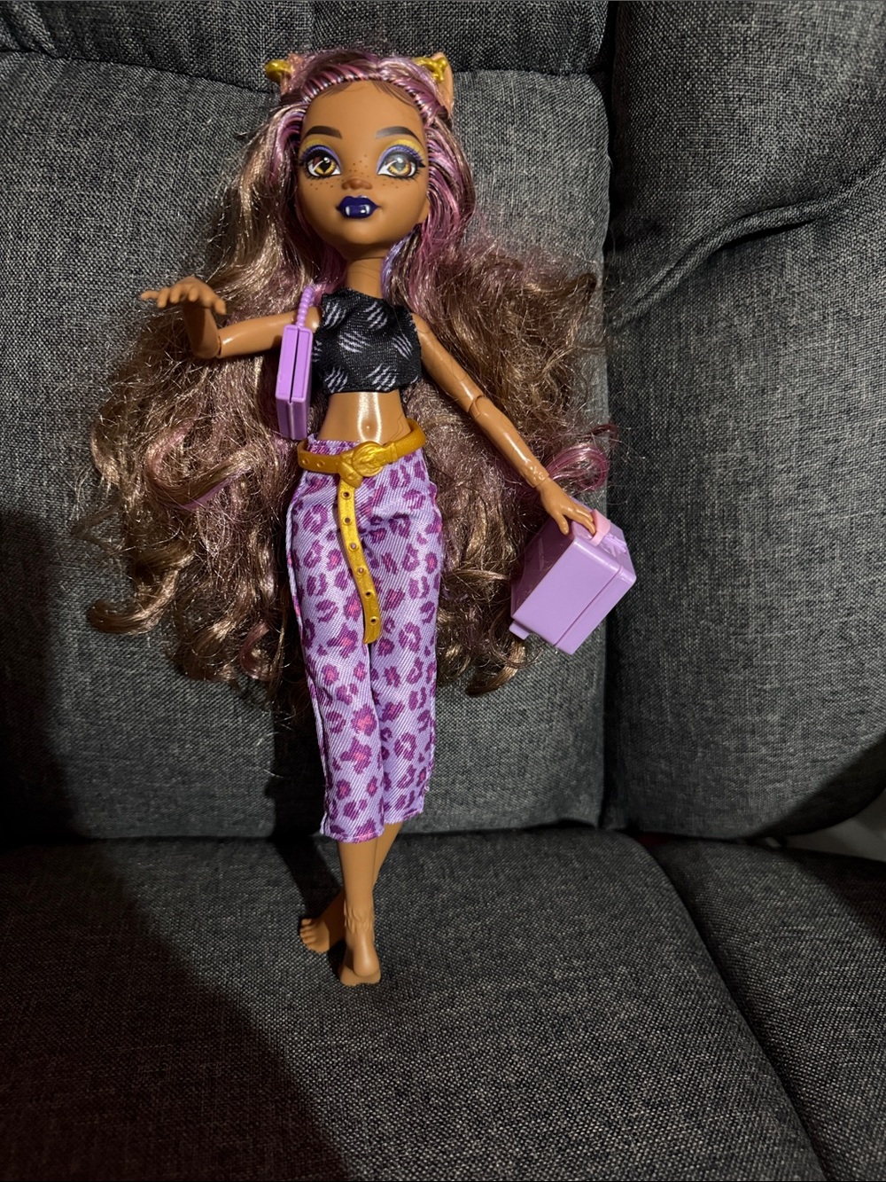 EUC Monster High’s Clawdeen Wolf wearing her Purple Leopard Print pants